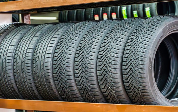 New Tires On A Shelf In A Store